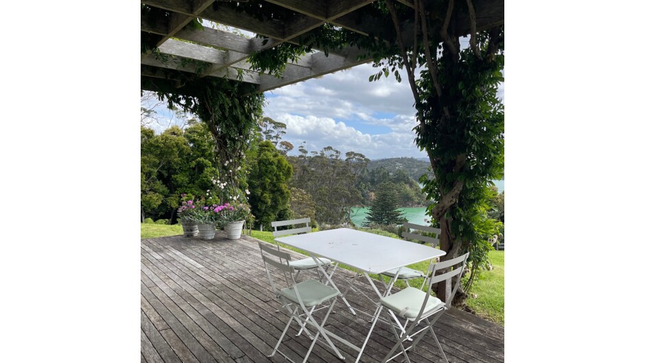 Enjoy a glass of wine or a BBQ one of the two generous decks, shaded by the wisteria and rose-clad pergola.  Wonderful views over Lily Bay.