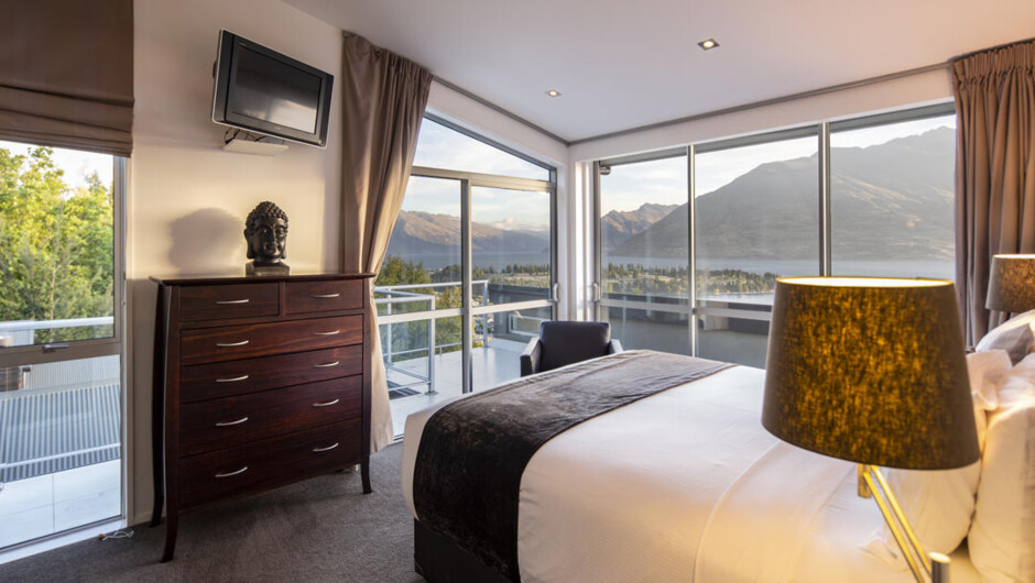 The Master bedroom on the upper level features a private courtyard, ensuite and stunning views towards the Remarkables.