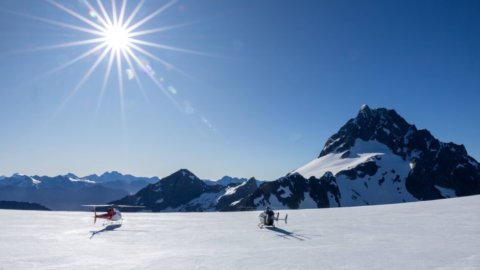 Our modern Airbus H125 Squirrel and H145 twin engine on Mt Tutoko Glacier in Fiordland National Park.