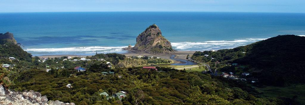 At the base of the Waitakere Ranges Regional Park you'll find the wild and beautiful Piha Beach