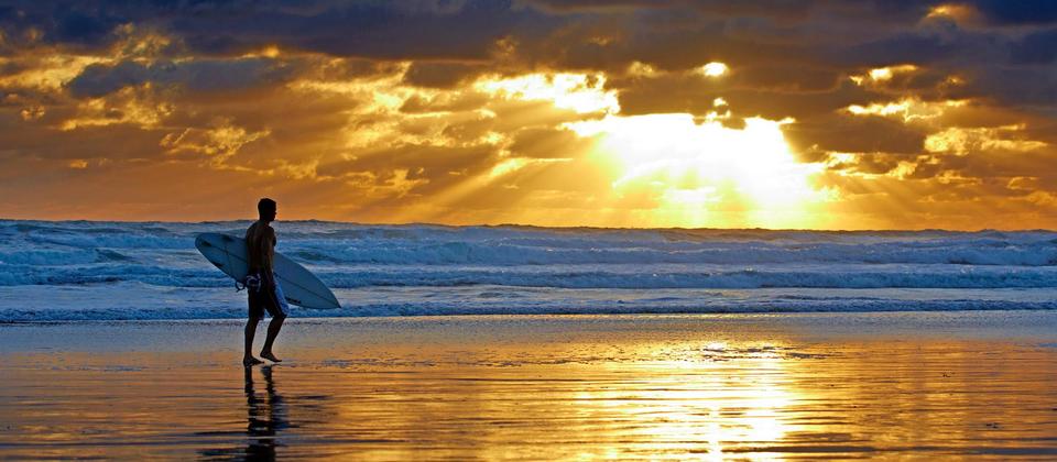 Surfing Muriwai, Auckland New Zealand.