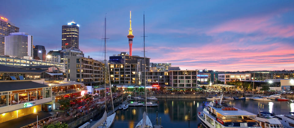 Restaurants and bars line the waterfront, with a backdrop of sheltered waters and sleek super yachts at the Viaduct Harbour.