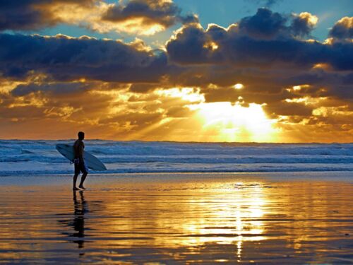 Surfing Muriwai, Auckland New Zealand.