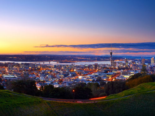 The evening skyline of Auckland’s city lights from Mount Eden.