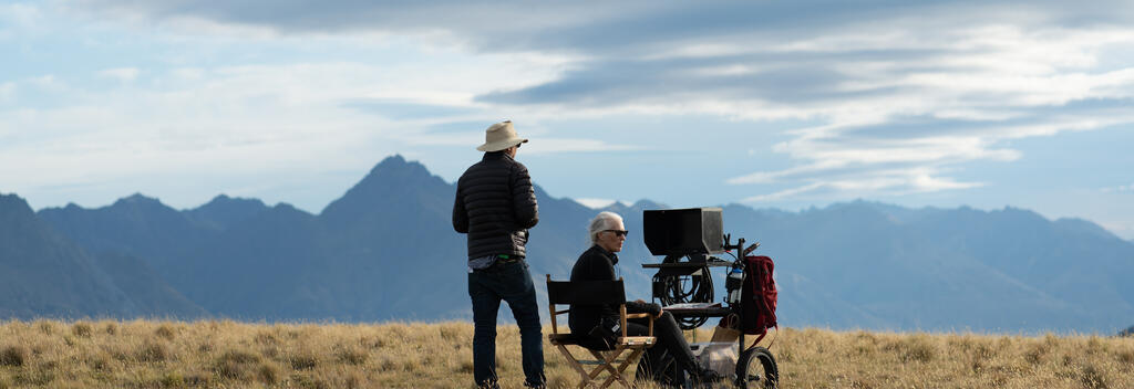 Dane Jane Campion and crew member on the set of The Power of the Dog