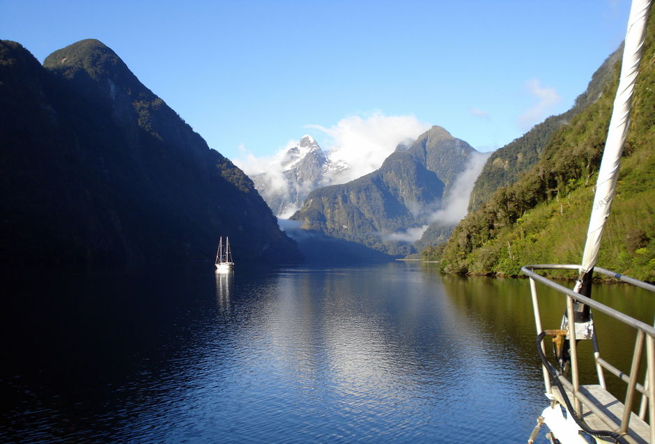 An overnight boat cruise lets you travel deeper into Milford or Doubtful Sound.