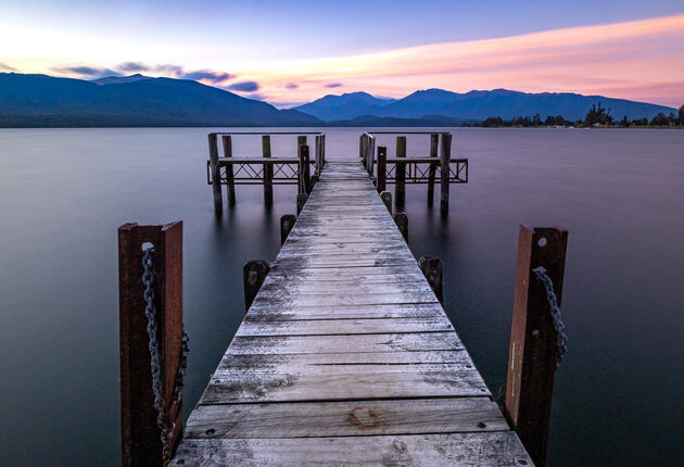 Te Anau, located on the eastern shore of Lake Te Anau is closest town to Milford Sound. Also known as the "gateway to the fiords". Find out more Fiordland and Te Anau. 
