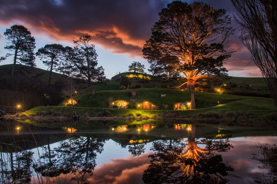 The Hobbiton™ Movie Set in the lush countryside setting of Matamata is a spectcular sight at sunrise or sunset.