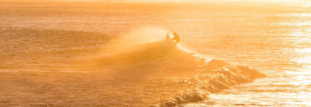 Surfing in Raglan