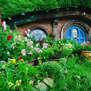 Explore the Real Middle Earth at the Hobbiton movie set, located on rolling farmland near Matamata, a two-hour scenic drive from Auckland.
