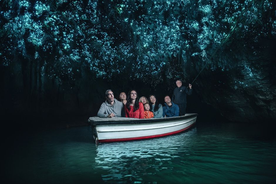 Take a boat ride into Waitomo Caves to see twinkling glowworms and ancient rock formations