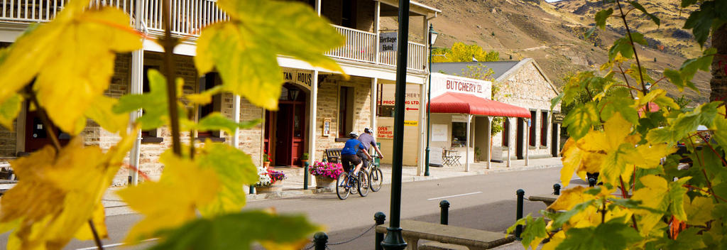 Cycling through Clyde during Autumn, Central Otago