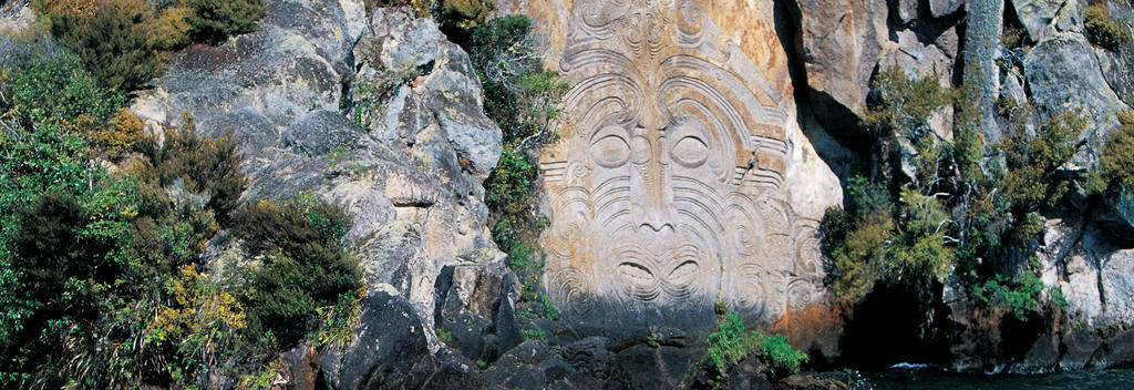 Maori carvings at Mine Bay, Lake Taupo