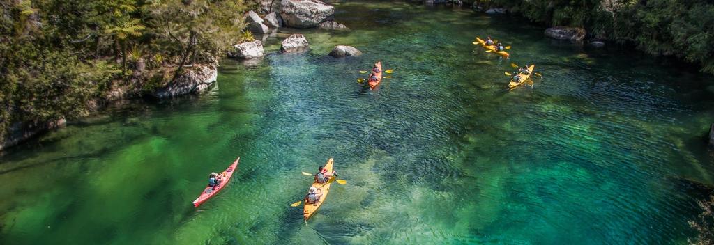 Kayaking in the Abel Tasman National Park&#039;s glistening waters with views of golden sand beaches is an unsurpassed experience.