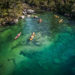 Kayaking in the Abel Tasman National Park&#039;s glistening waters with views of golden sand beaches is an unsurpassed experience.