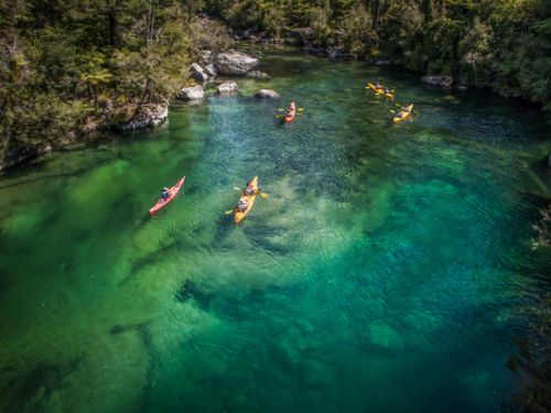 Kayaking in the Abel Tasman National Park&#039;s glistening waters with views of golden sand beaches is an unsurpassed experience.
