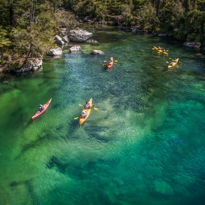 Kayaking in the Abel Tasman National Park&#039;s glistening waters with views of golden sand beaches is an unsurpassed experience.