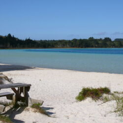 The crystal-clear Kai Iwi Lakes are popular with kiwi holidaymakers.
