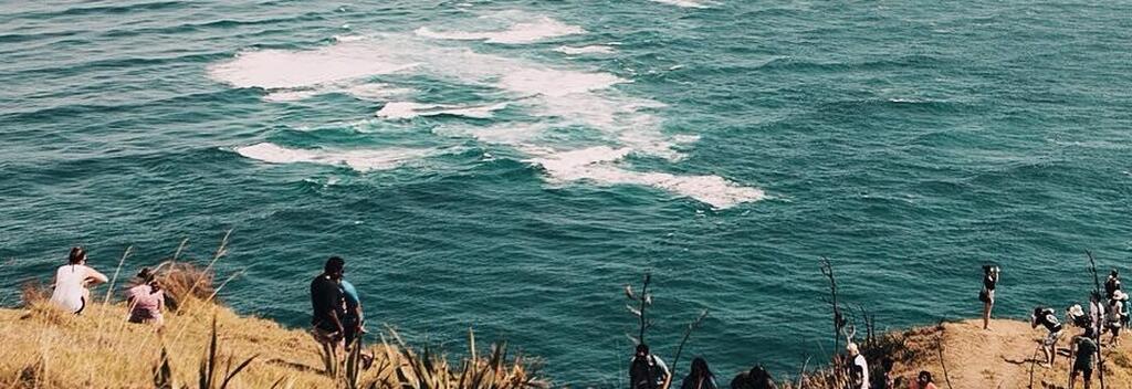 Watch oceans collide at New Zealand's most northern tip.