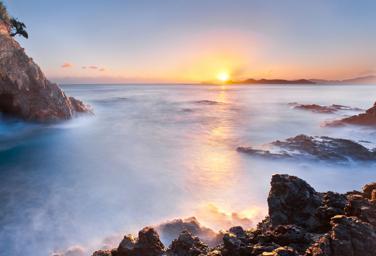 New Zealand is the first country in the world to see the light of day. On the eastern coast of New Zealand there are some awesome spots to watch the sunrise on the first day of the New Year. Check them out.