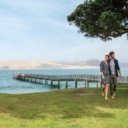 Easy-going Opononi and nearby Ōmāpere are places to live the beach life