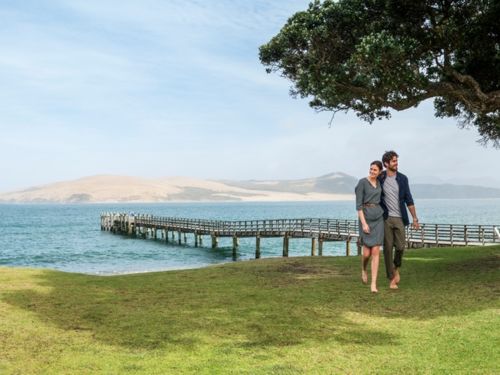 Easy-going Opononi and nearby Ōmāpere are places to live the beach life