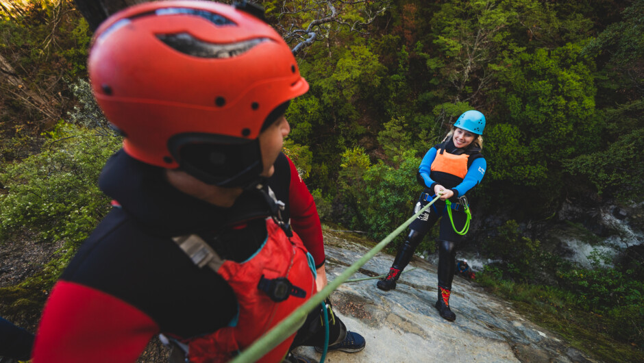 Abseiling into the canyon