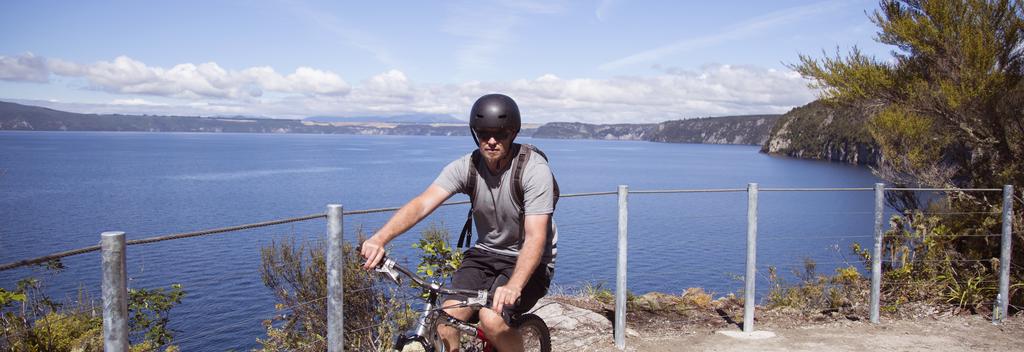 Riding the Waihora section of the Great Lake Trail