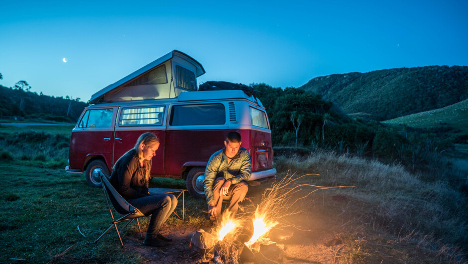 VW 72 Westfalia kombi chilling out around a fire - Sth Island NZ