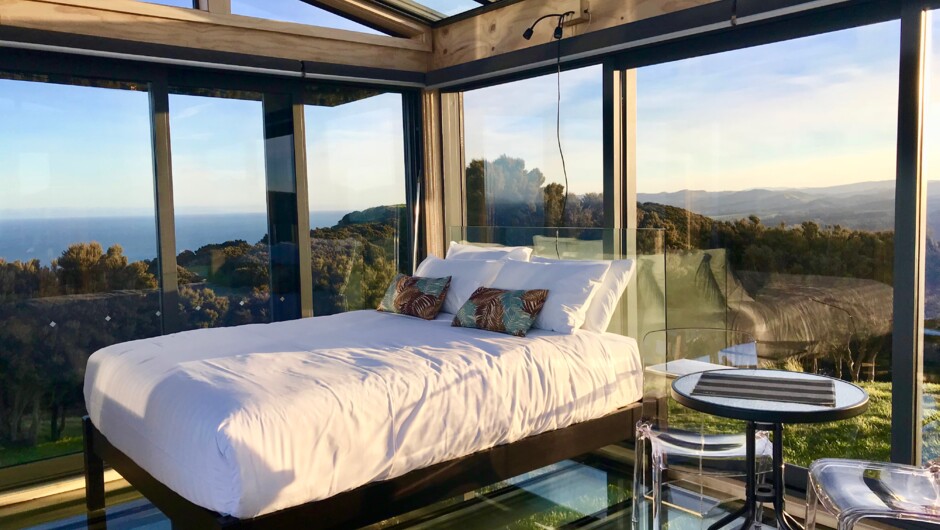 Glass walls, glass roof, glass floor - float in the beautiful landscape at the Atatū PurePod
