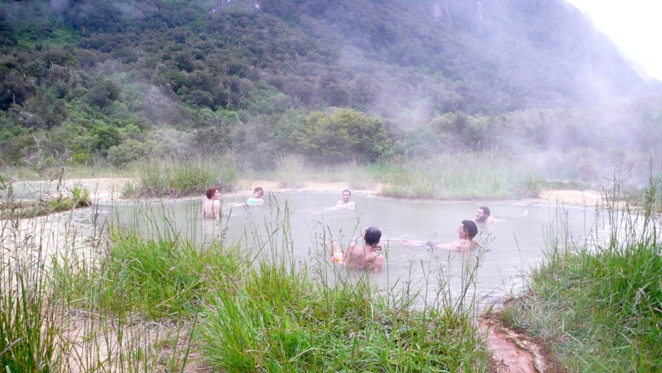 Soaking in the warming hotpools of Welcome Flat