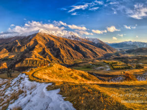 This vantage point on the Crown Range Road between Queenstown and Wanaka, offers the kind of amazing views we feature.