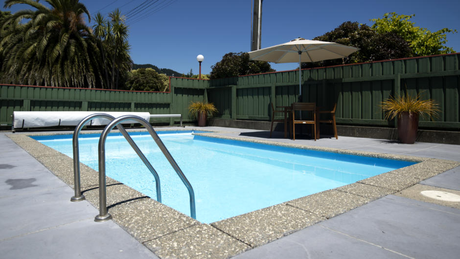 Solar-heated summer pool