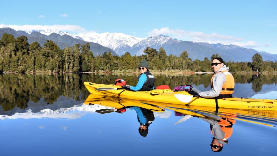 Paddle with us on a mirror lake, with glacier views!