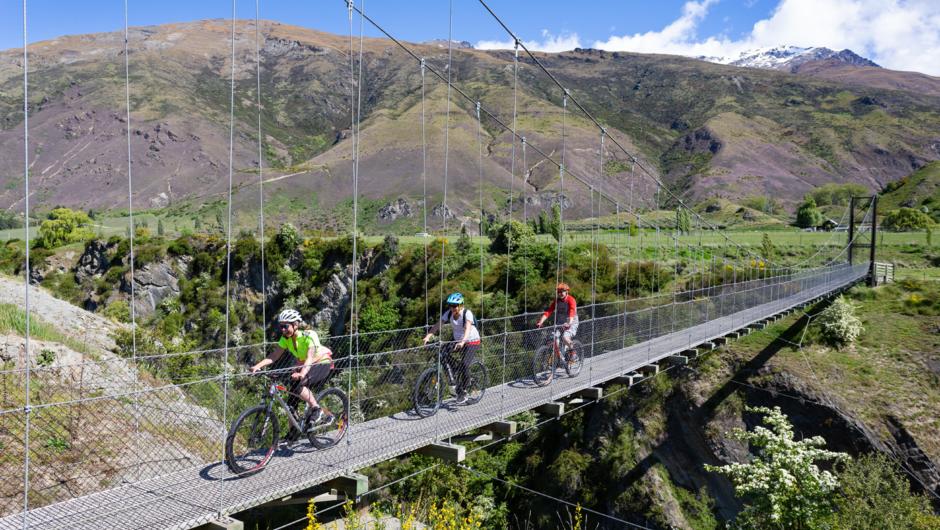 Biking the suspension bridges along the Queenstown Trail