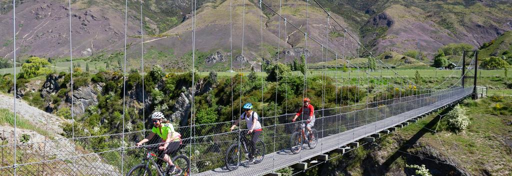 Biking the suspension bridges along the Queenstown Trail