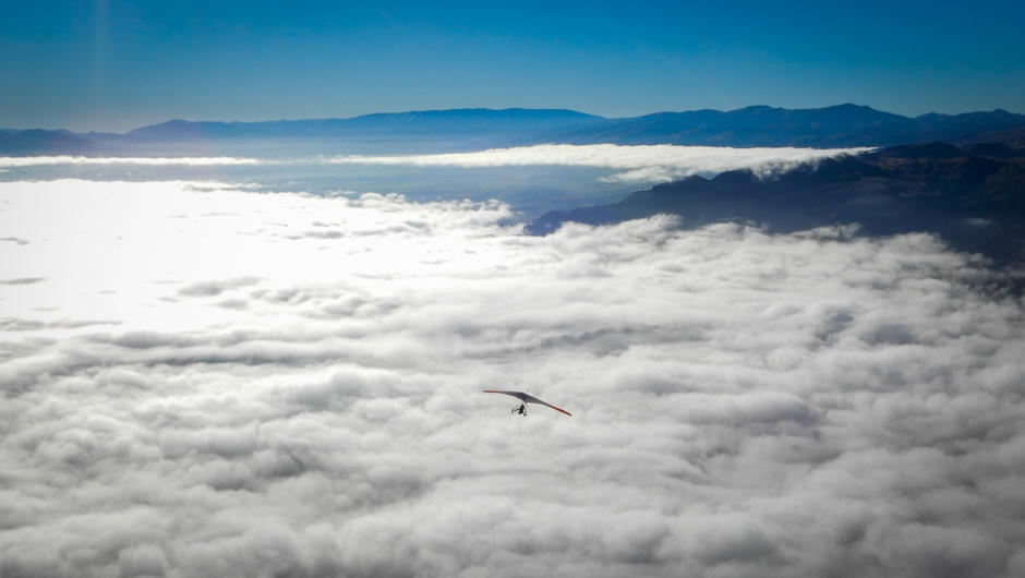 Gliding like a bird over the clouds