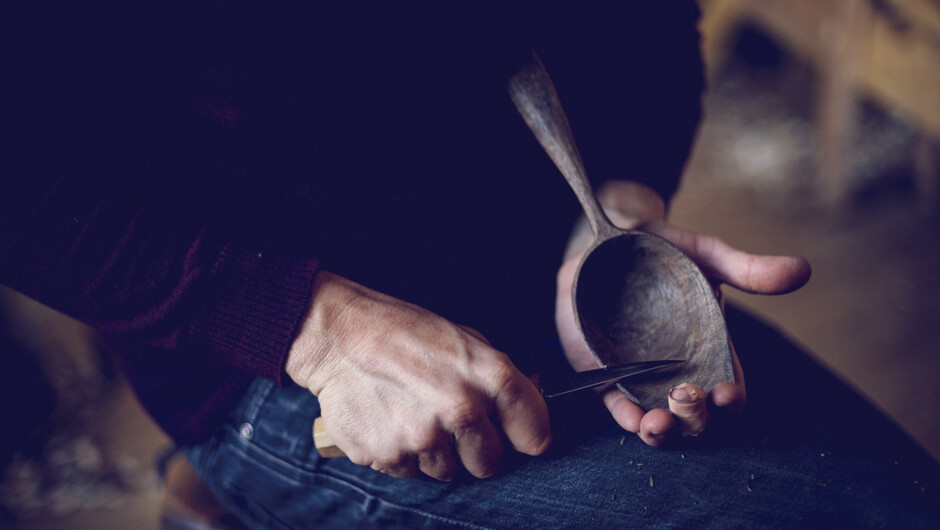 Douglas Horrell of Cleft Craft carving a spoon from black walnut.