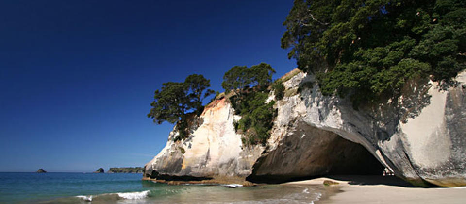 The famous Cathedral Cove, licked by the Pacific Ocean.