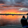 Couple watching the sunset in the Bay of Islands