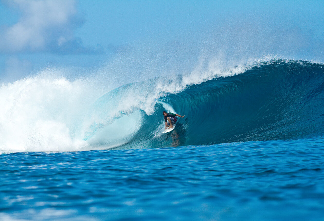 Surfen auf den Wellen in Gisborne