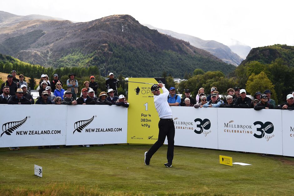 Professional golfer shooting the golf ball at Millbrook Resort golf course
