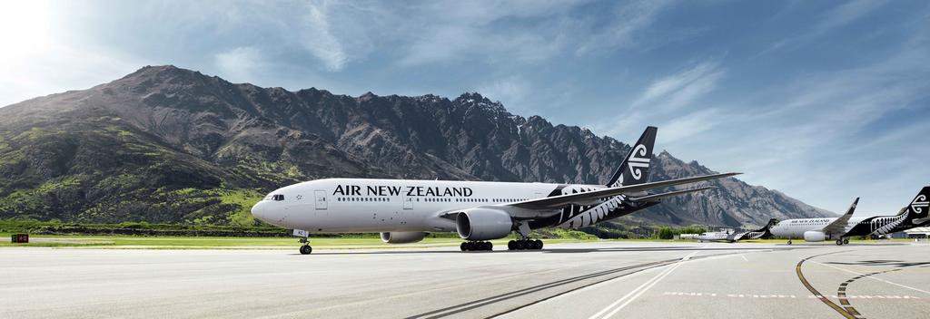 Air New Zealand plane at the beautiful Queenstown Airport, nestled in the mountains near Lake Wakatipu.
