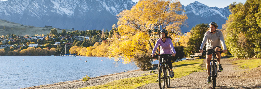 Cycling by Lake Wakatipu in autumn