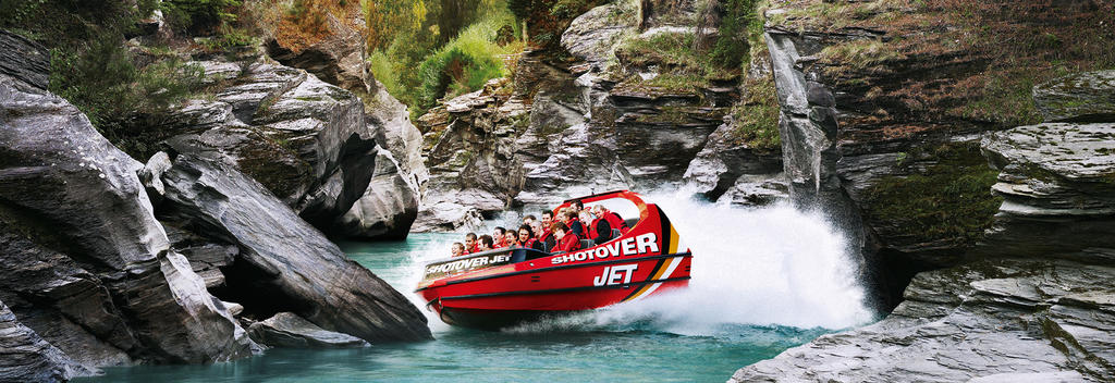 Experience a thrilling ride along the Shotover River in Queenstown.