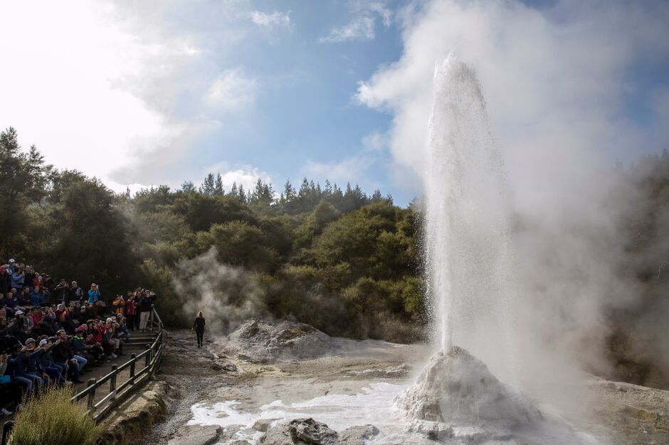Soak in the natural hot springs of Kerosene Creek, Rotorua