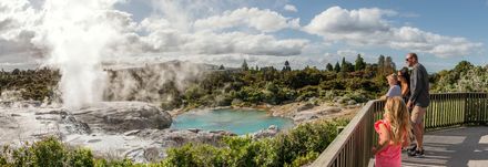 Visit Te Puia in Rotorua to experience Maori culture and geothermal wonders.