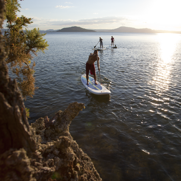 Paddleboarding as the sun rises over Lake Rotorua is magic.