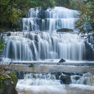 Marvel at the three-tiered waterfall in the Catlins