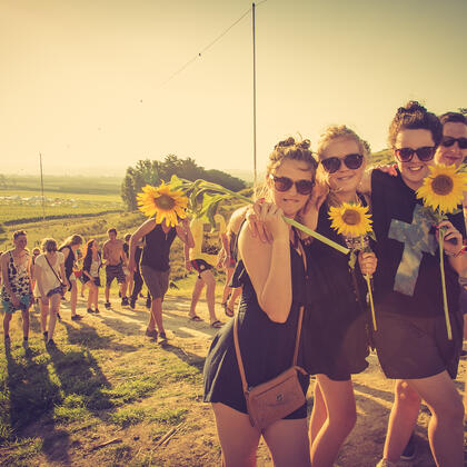 Group enjoy the first sunrise at Rhythm and Vines